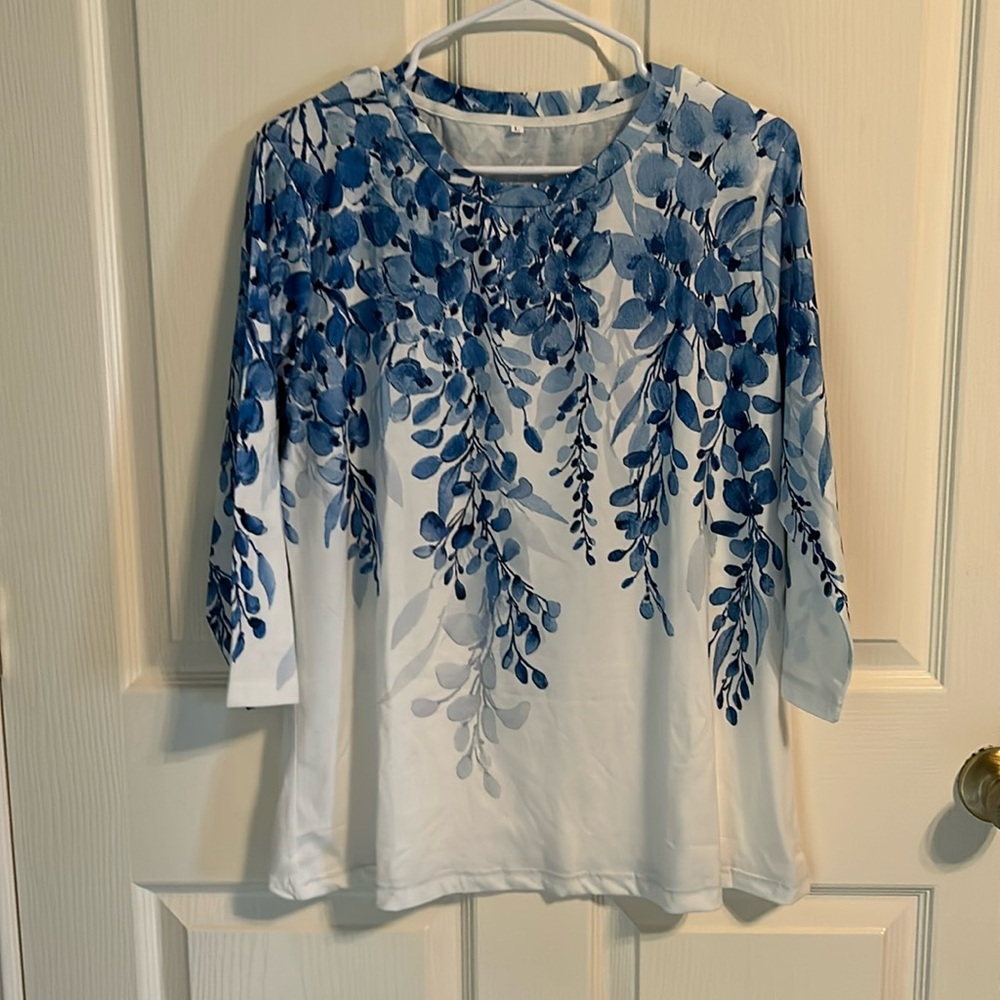 Blue and white tunic top. Size large, knit. NWOT